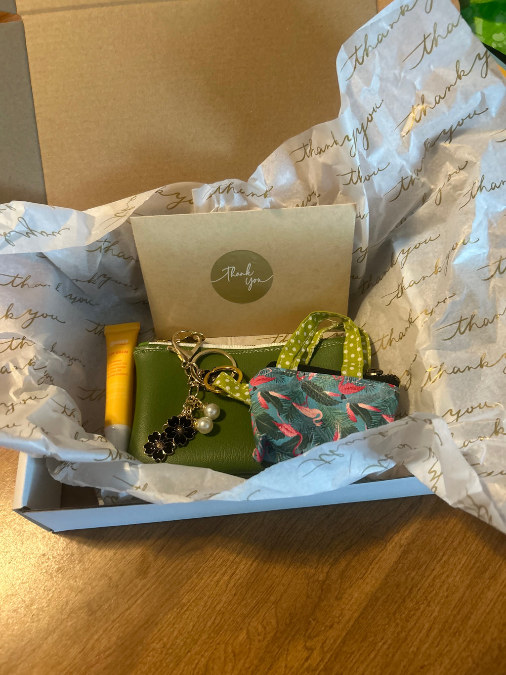 Poppi Purse Club unboxing - green wristlet and mini purse with thank you card